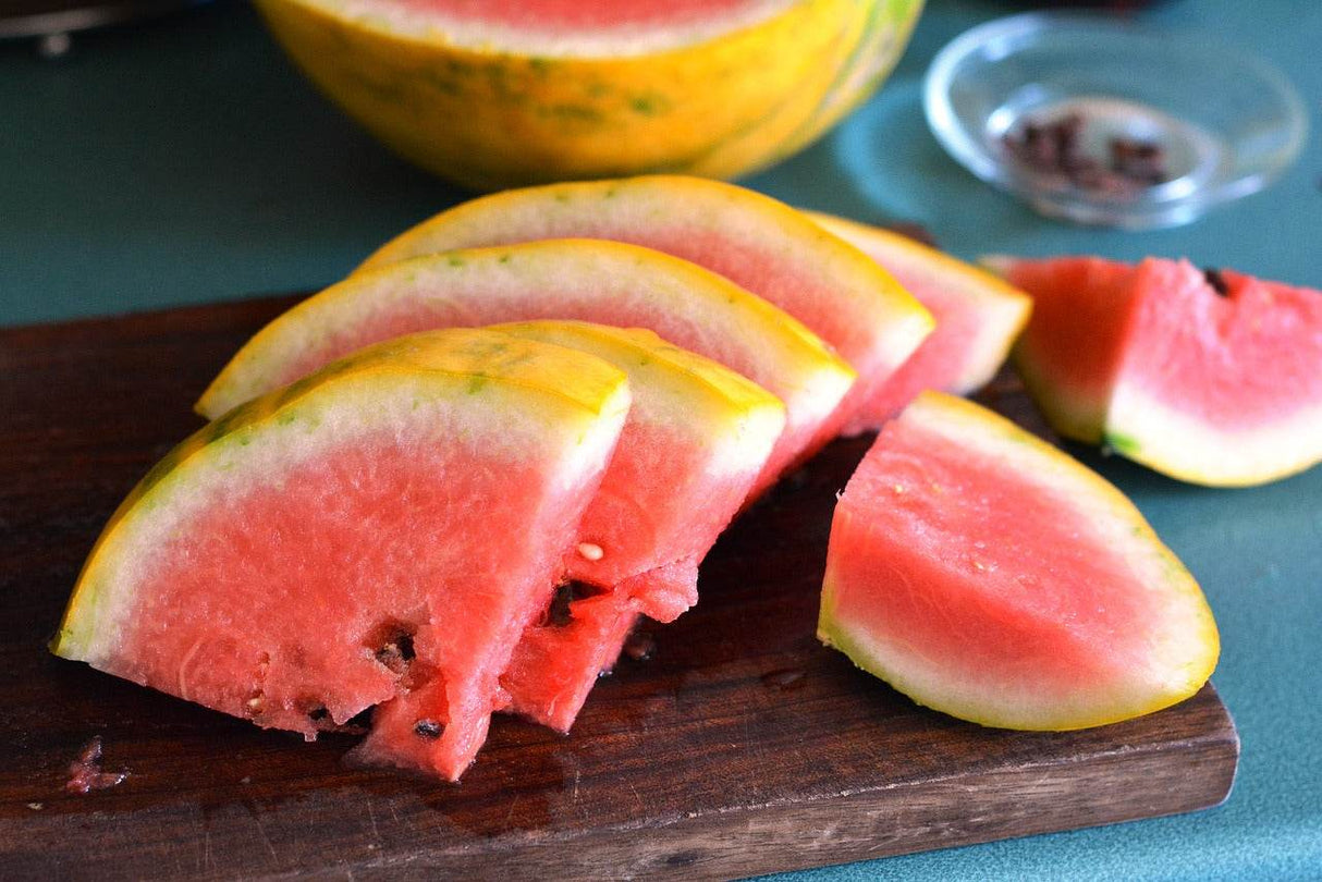 Red-flesh Watermelon seeds from SeedsNow with moon and stars design on the packaging, ideal for planting or collection.