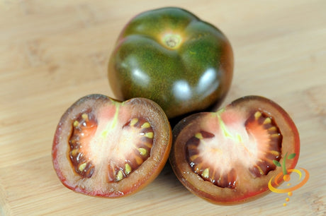 Cherry Chocolate Tomato indeterminate seeds from SeedsNow, showing vibrant ripe cherry tomatoes on the vine.