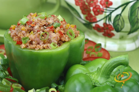 Yolo Wonder sweet pepper plant with ripe peppers, grown from SeedsNow seeds, showcasing vibrant green and red fruits on the plant.